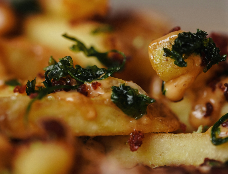 Röst-Erdäpfel mit Asian Greens und Speck